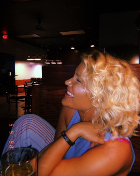 ChelseyGrace in a blue top caught on the camera.